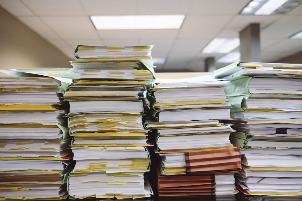 Evidence tracking software can help your department get rid of stacks of paper like this.